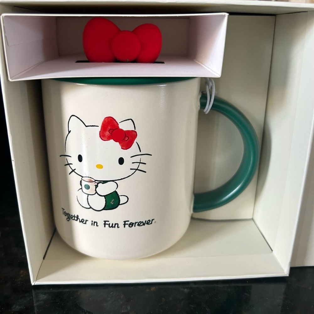 Hello Kitty Cream Mug with Red Bow and Green Handle